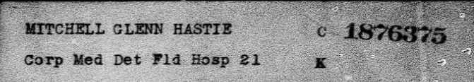 A black-and-white document showing Glenn Hastie Mitchell's World War I military service details. It lists him as a Corporal in the Medical Detachment of Field Hospital 21, with a service number 1876375. The document has a typewritten appearance, with slightly grainy texture.
